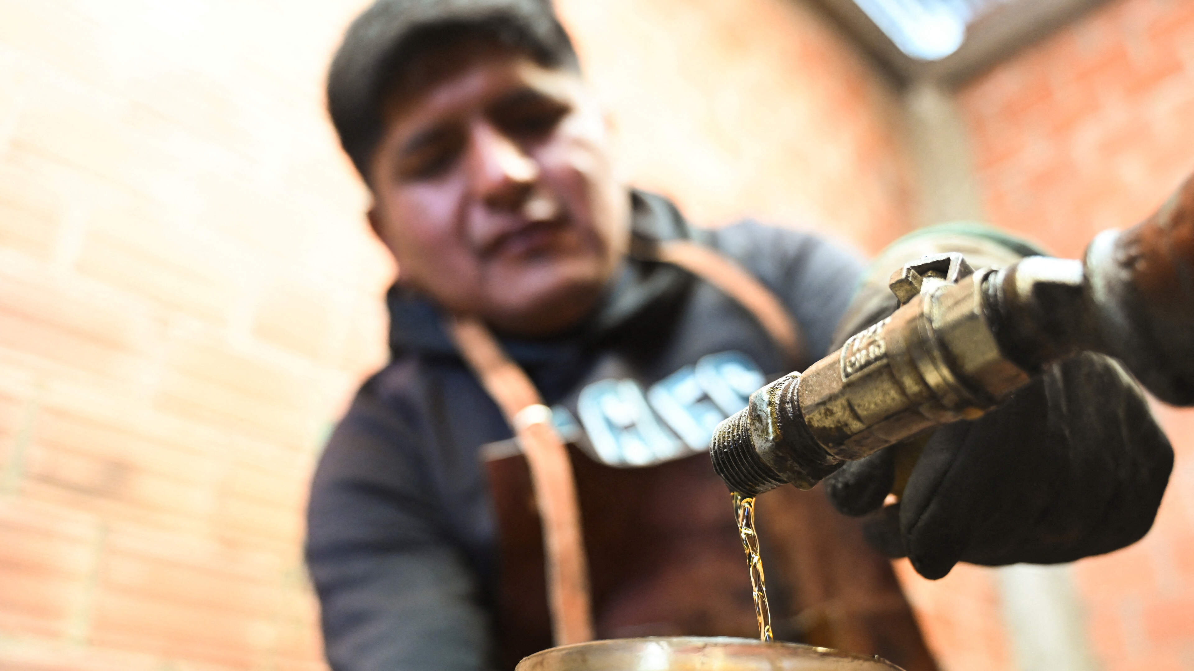 As diesel prices soar, Bolivian farmer turns trash into tractor fuel